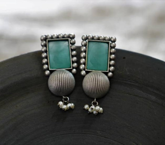 Black Oxidized earring with Pastel colour stones.